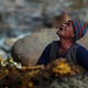 Illustration for article titled Stunning photos show the ancient tradition of honey hunting in Nepal